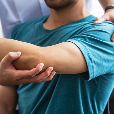 Person Undergoing Elbow Physiotherapy