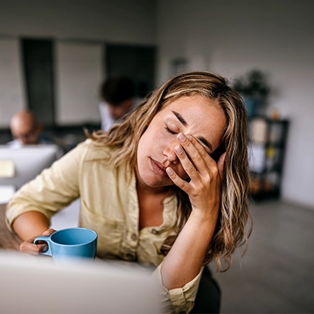 Woman With Head Pain